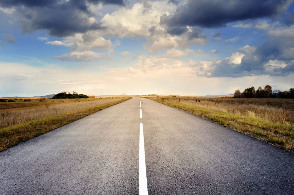 Paved asphalt road into the horizon